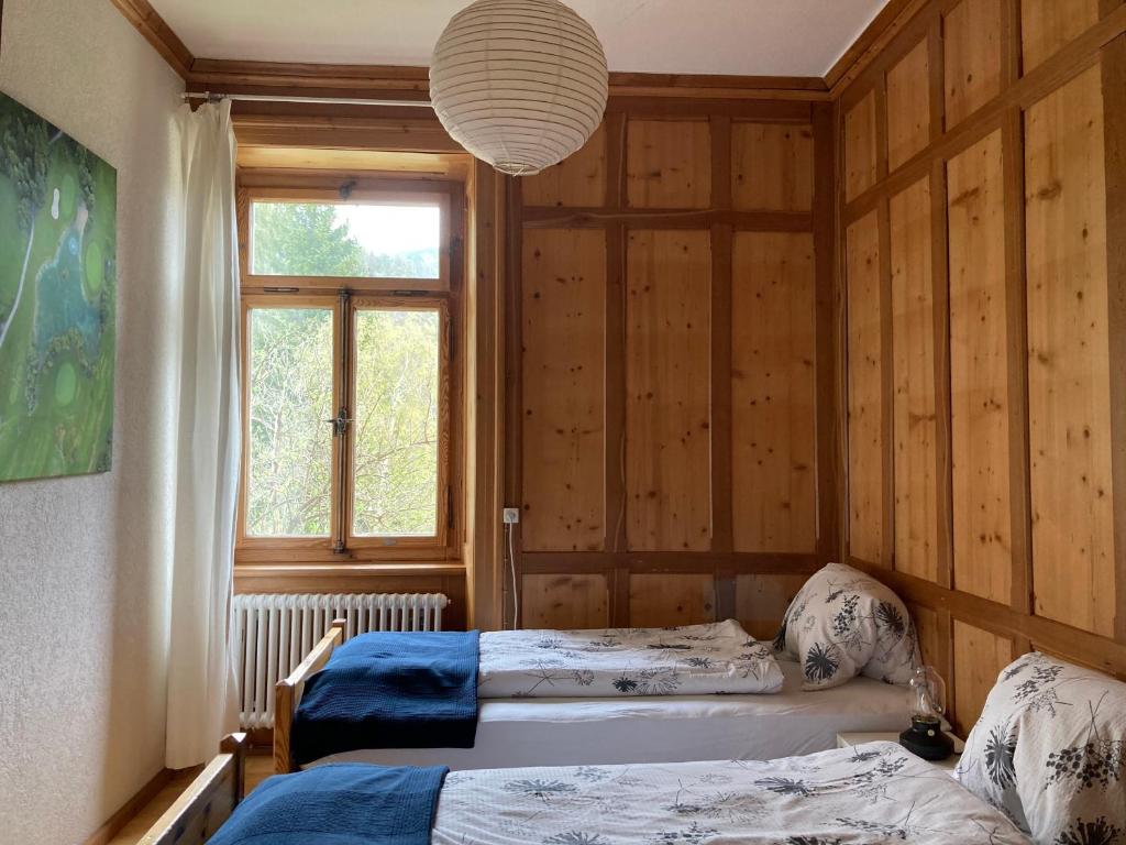 Postel nebo postele na pokoji v ubytování Felsahus