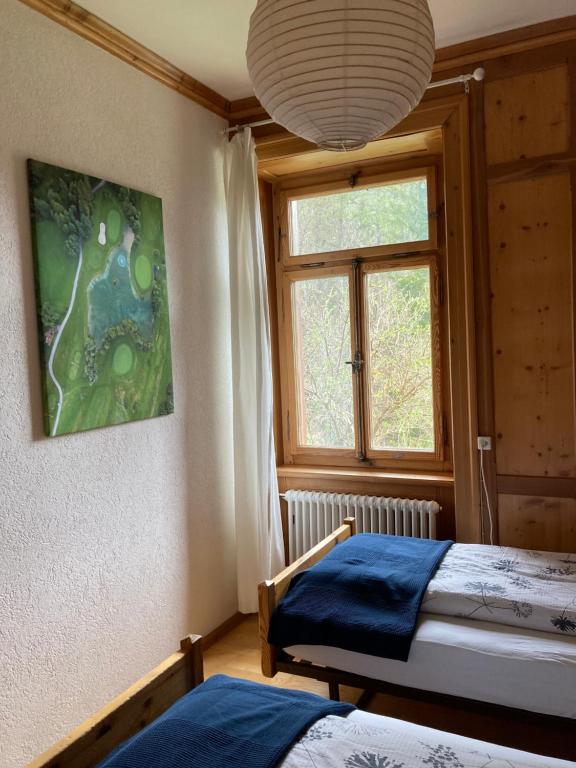 Postel nebo postele na pokoji v ubytování Felsahus
