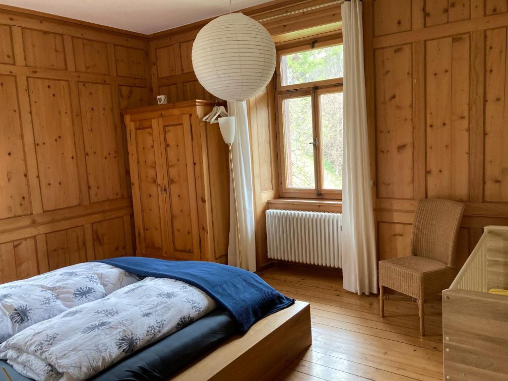 Postel nebo postele na pokoji v ubytování Felsahus
