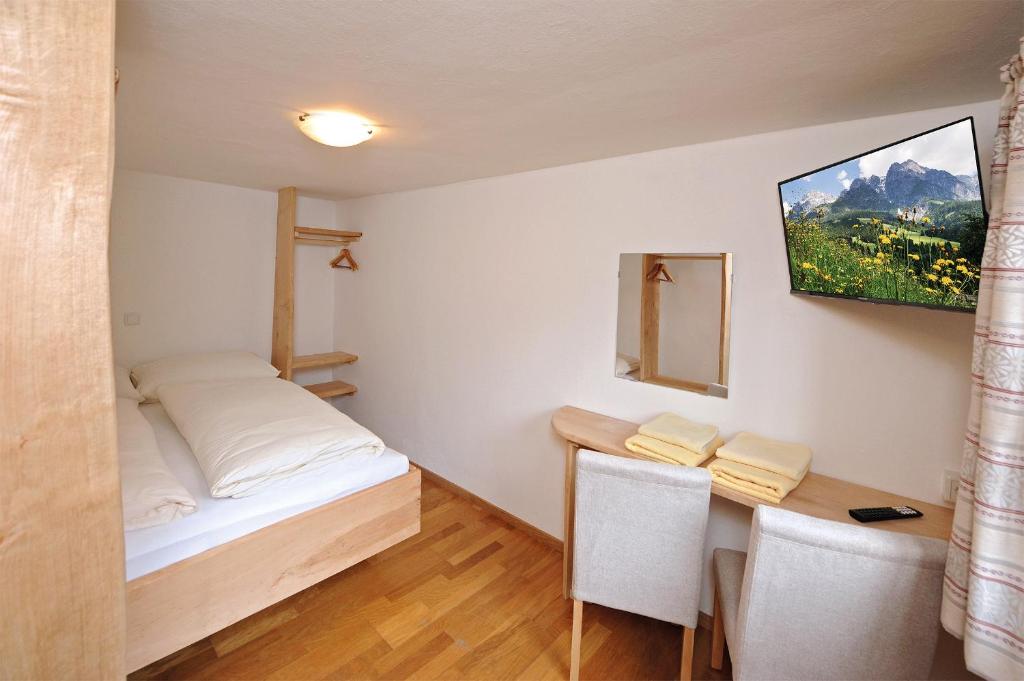 Postel nebo postele na pokoji v ubytování Riederhof