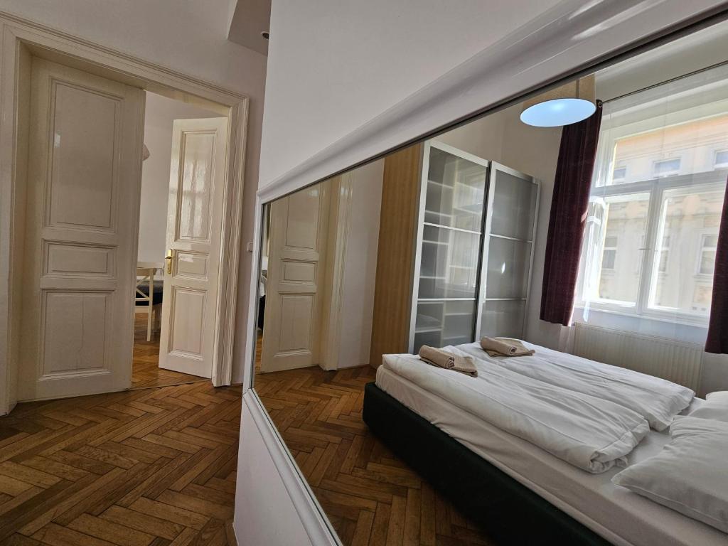 Postel nebo postele na pokoji v ubytování Slezska Apartments