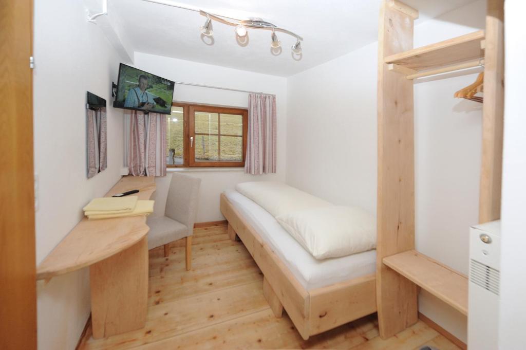 Postel nebo postele na pokoji v ubytování Riederhof