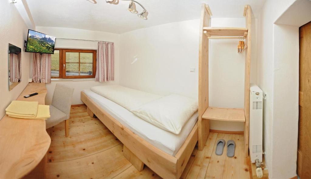 Postel nebo postele na pokoji v ubytování Riederhof