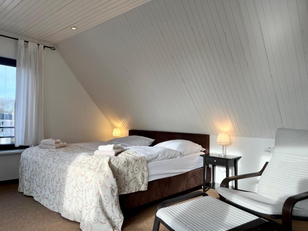 Ένα ή περισσότερα κρεβάτια σε δωμάτιο στο Appartementhaus Seemöwe Rosenmöwe