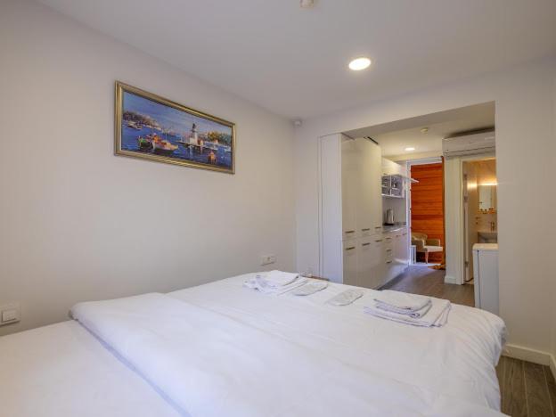 Postel nebo postele na pokoji v ubytování Hagia sophia hotels