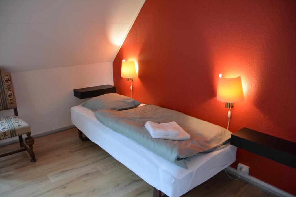 Postel nebo postele na pokoji v ubytování Abild Hotel