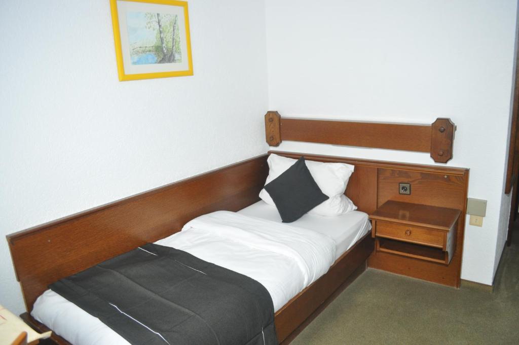 Postel nebo postele na pokoji v ubytování Hotel Kühns Mühle