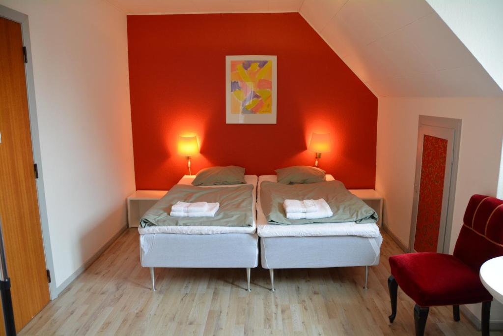 Postel nebo postele na pokoji v ubytování Abild Hotel