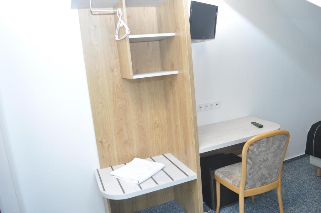 TV a/nebo společenská místnost v ubytování Hotel Kühns Mühle