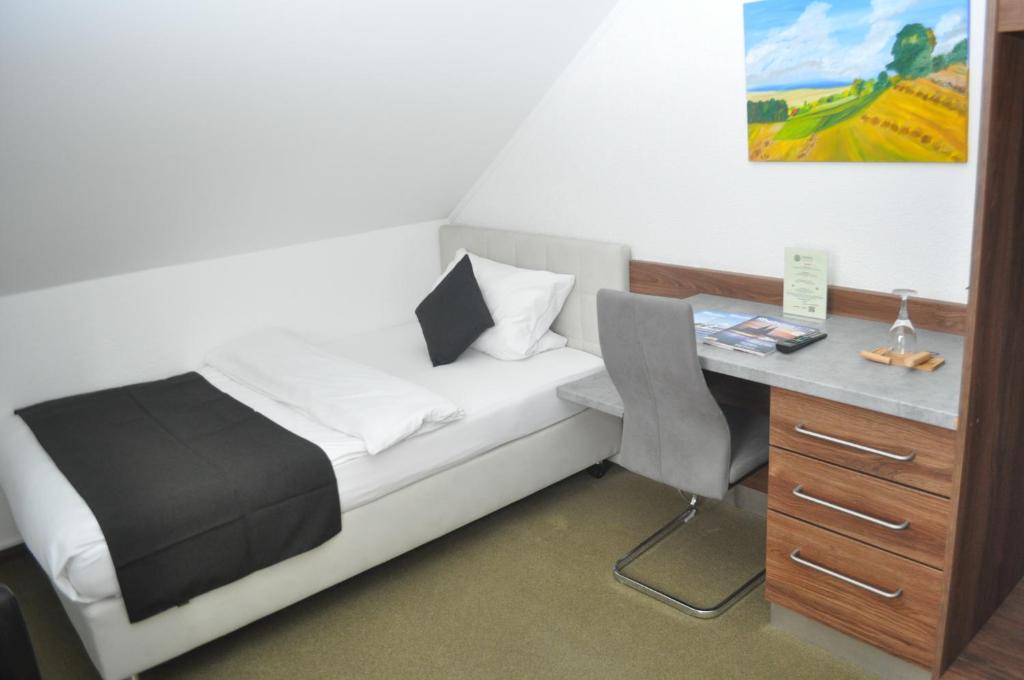 Postel nebo postele na pokoji v ubytování Hotel Kühns Mühle