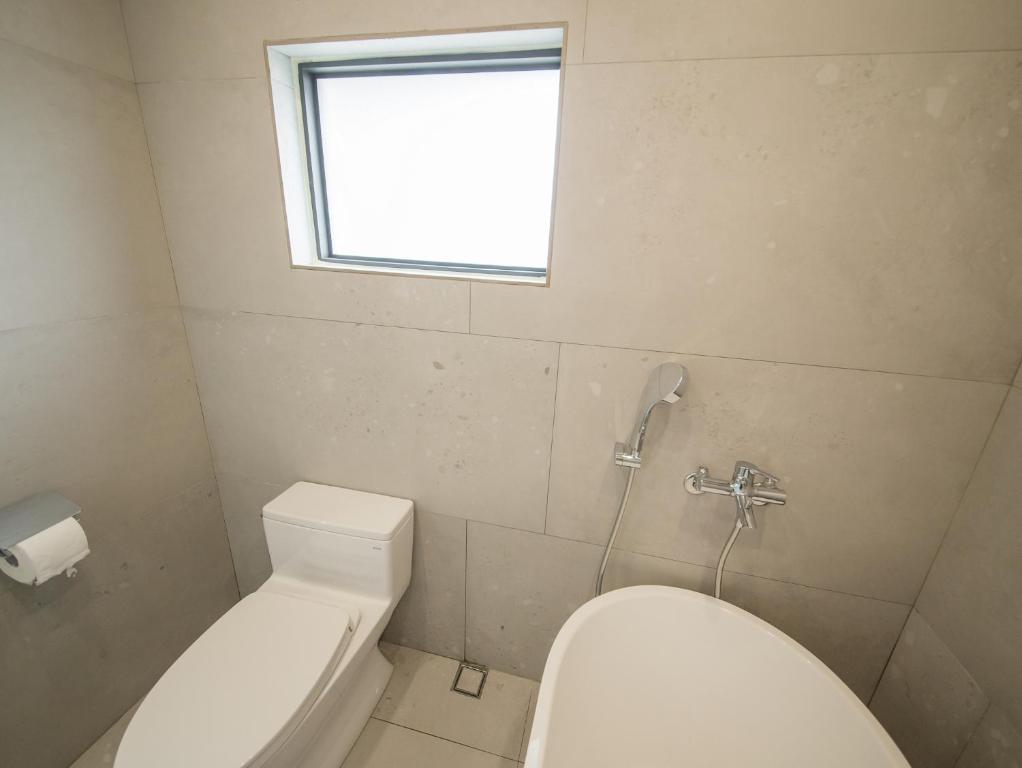 Koupelna v ubytování LIVIN Hotel