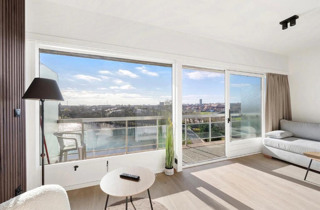 En eller flere senge i et værelse på Laguna beach volledig gerenoveerd 1 slpk appartement