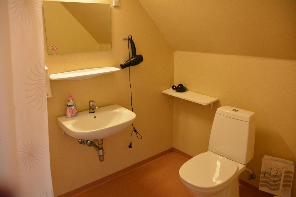 Koupelna v ubytování Abild Hotel