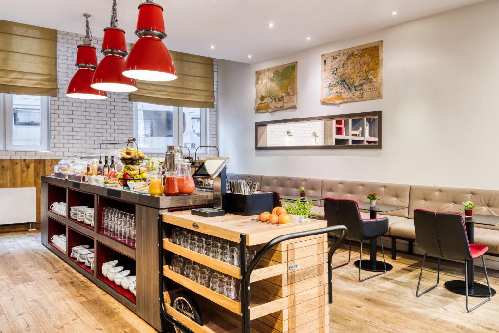 Kuchyň nebo kuchyňský kout v ubytování Citadines Michel Hamburg