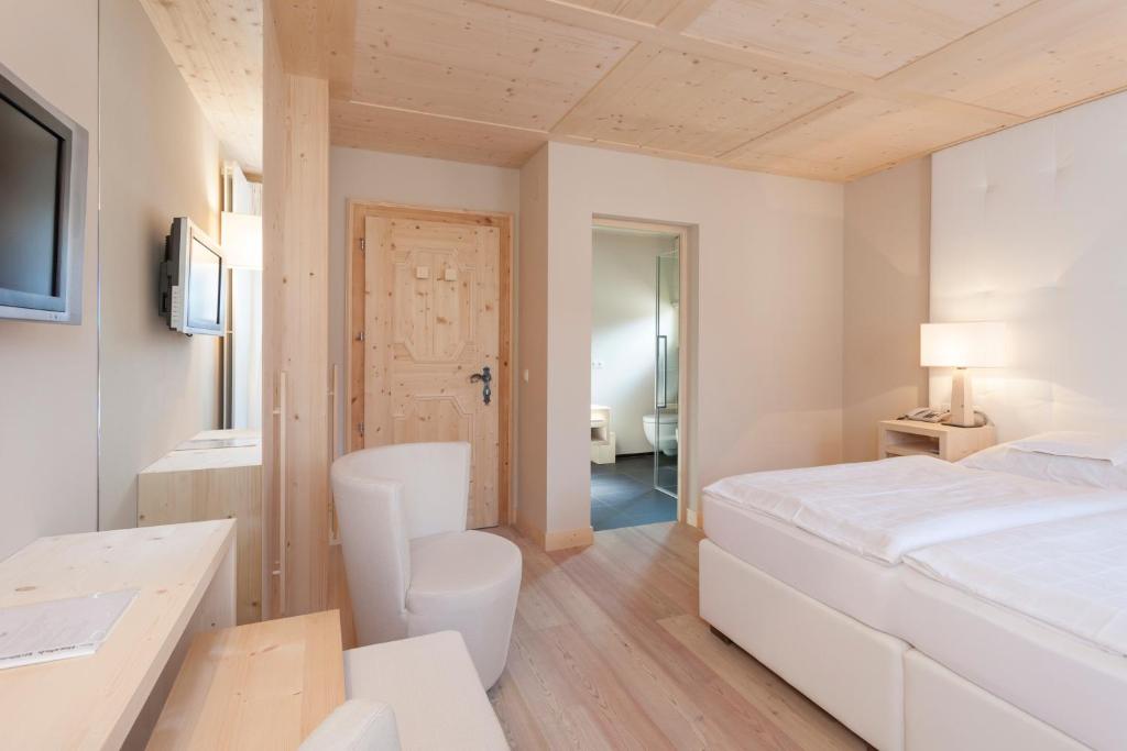 Postel nebo postele na pokoji v ubytování Hotel MAYR