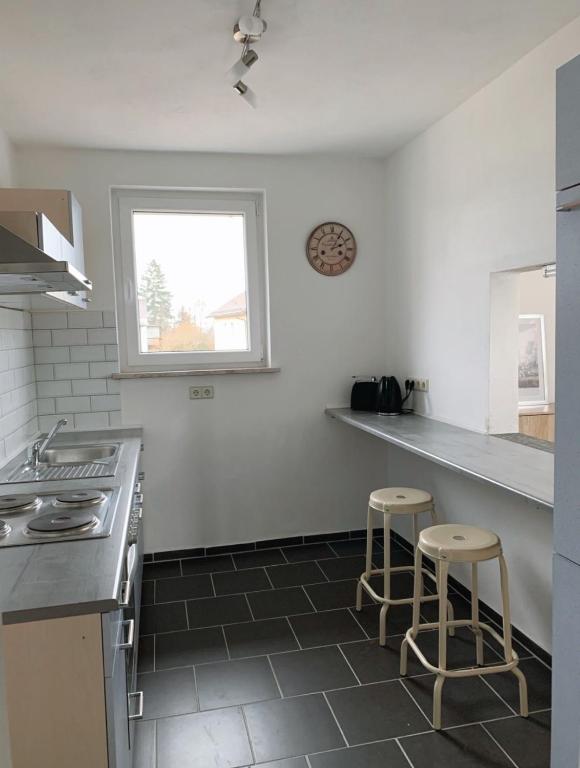 Kuchyň nebo kuchyňský kout v ubytování Gasthof Hotel Bräustübl