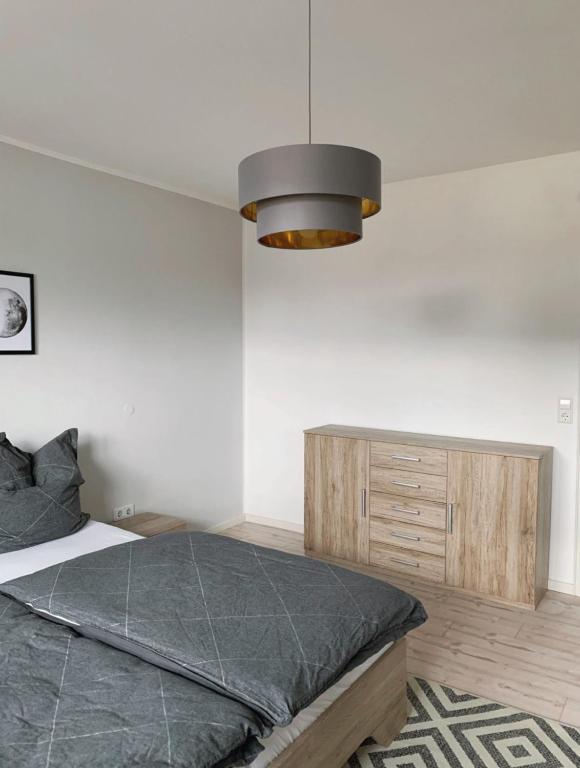 Postel nebo postele na pokoji v ubytování Gasthof Hotel Bräustübl