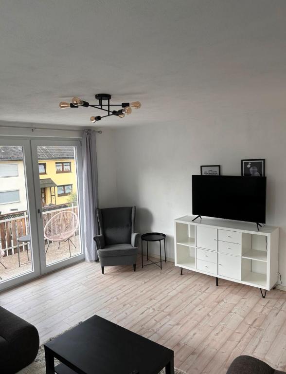 TV a/nebo společenská místnost v ubytování Gasthof Hotel Bräustübl