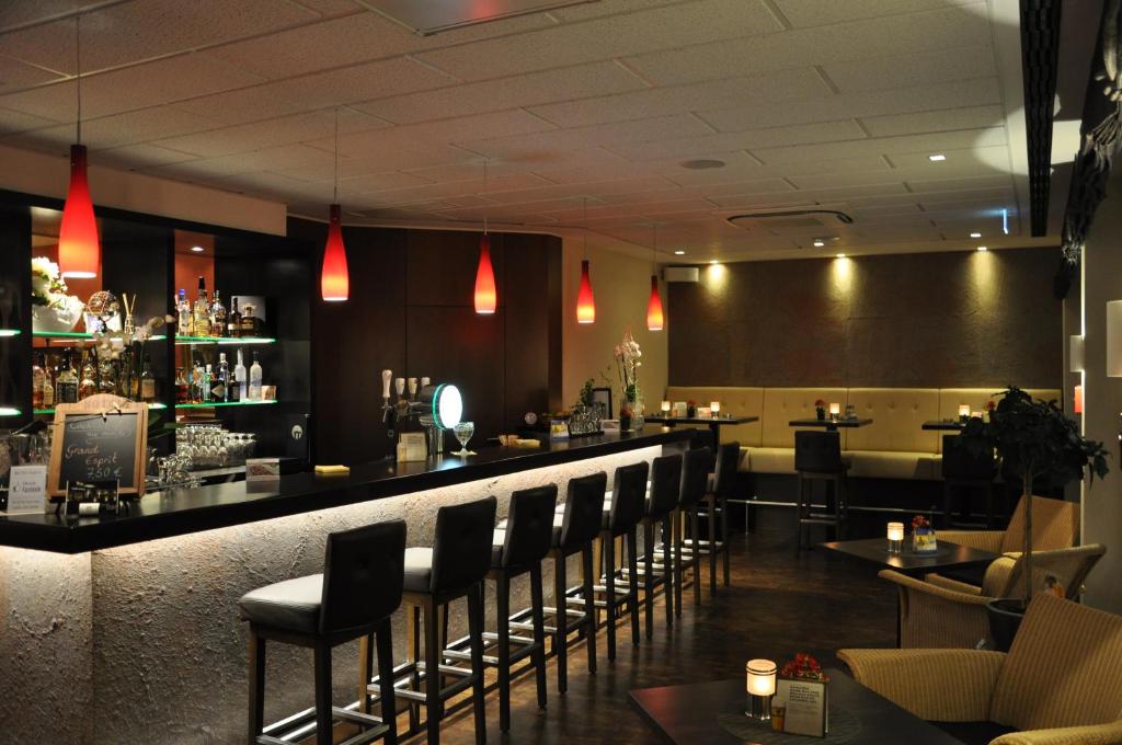 Lounge oder Bar in der Unterkunft Hotel Merkur