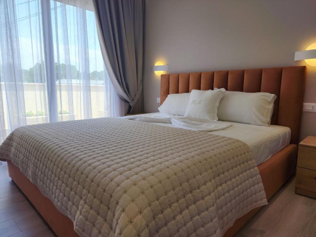 Postel nebo postele na pokoji v ubytování Hotel Maren Durres