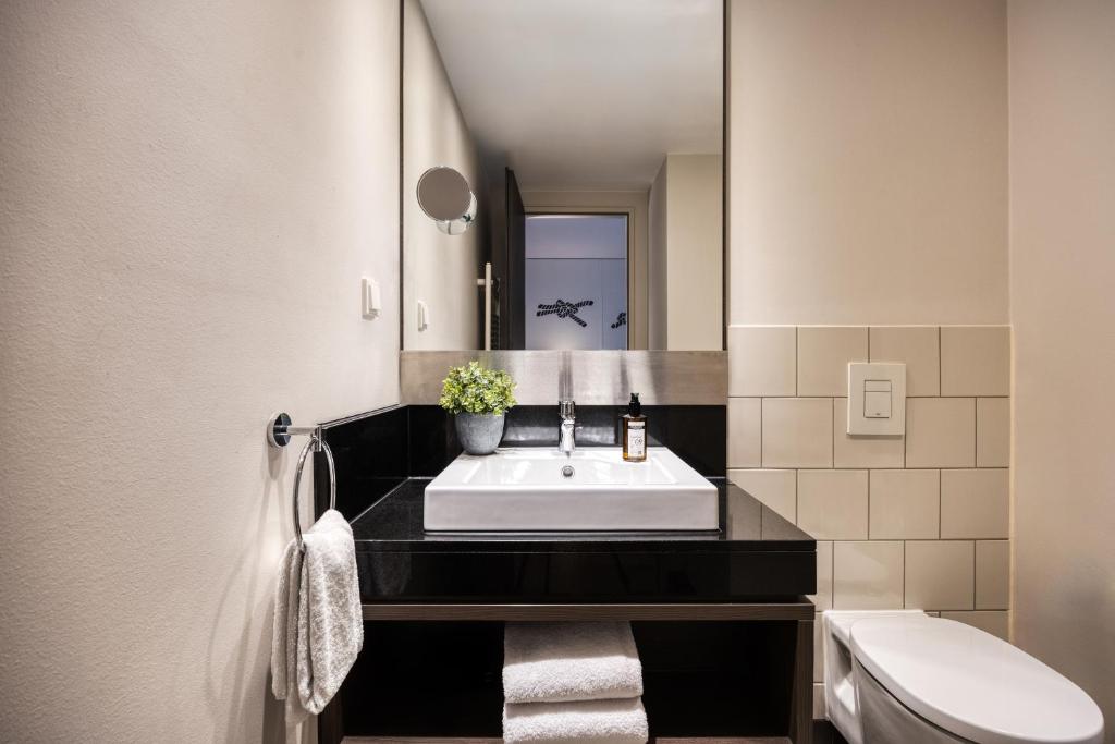 Koupelna v ubytování Citadines Michel Hamburg