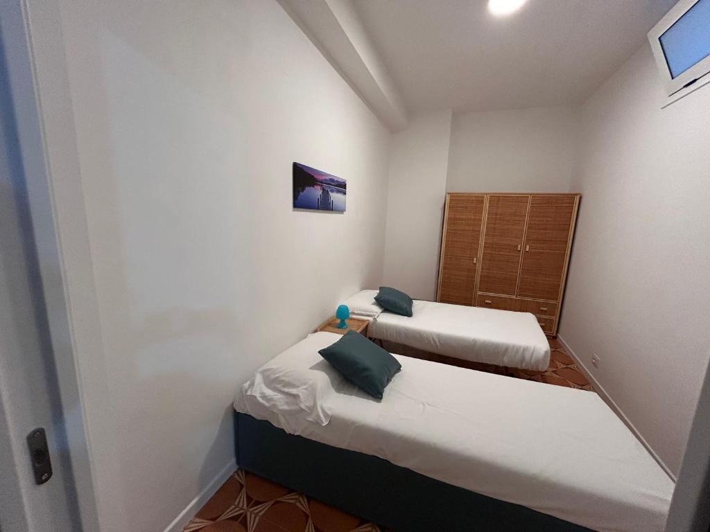 Postel nebo postele na pokoji v ubytování La casa di Vicky