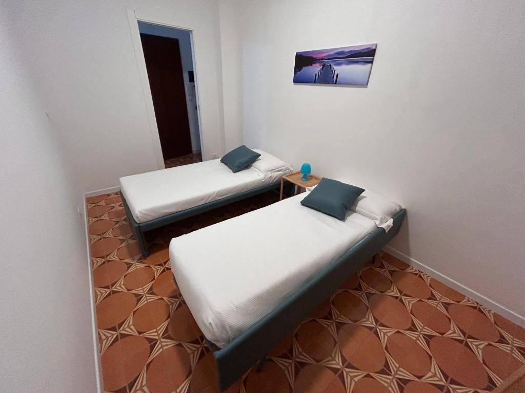 Postel nebo postele na pokoji v ubytování La casa di Vicky