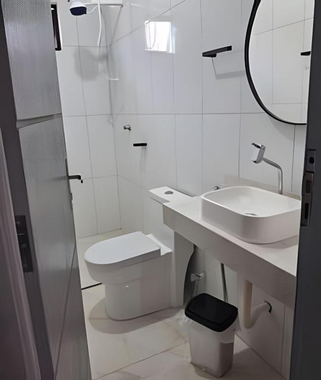 Koupelna v ubytování AP 5 C/Garagem>Ar>Wifi>Cozinha>Tv Disney+>Pet free
