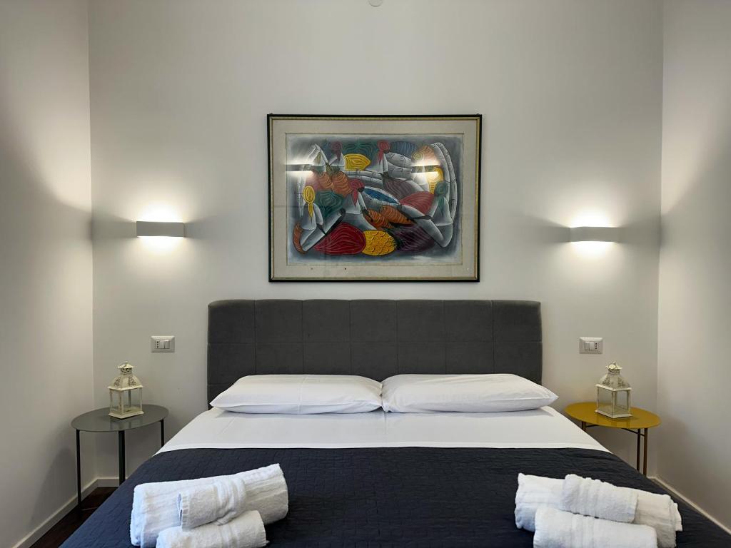 Postel nebo postele na pokoji v ubytování Dante 134 Rooms