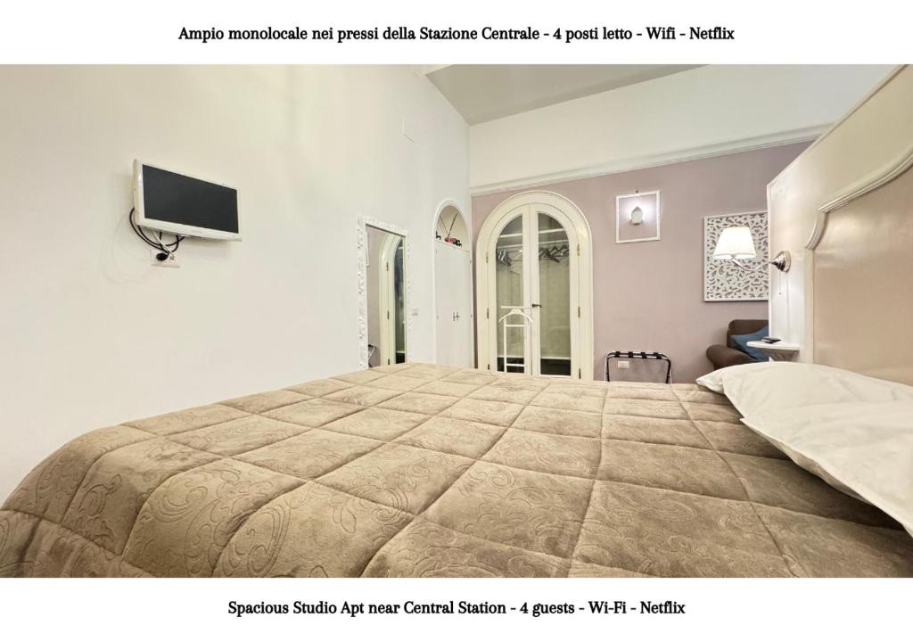 Posteľ alebo postele v izbe v ubytovaní METRO GARIBALDI - Loft con Wifi e 4 posti letto presso la Stazione Centrale di Napoli