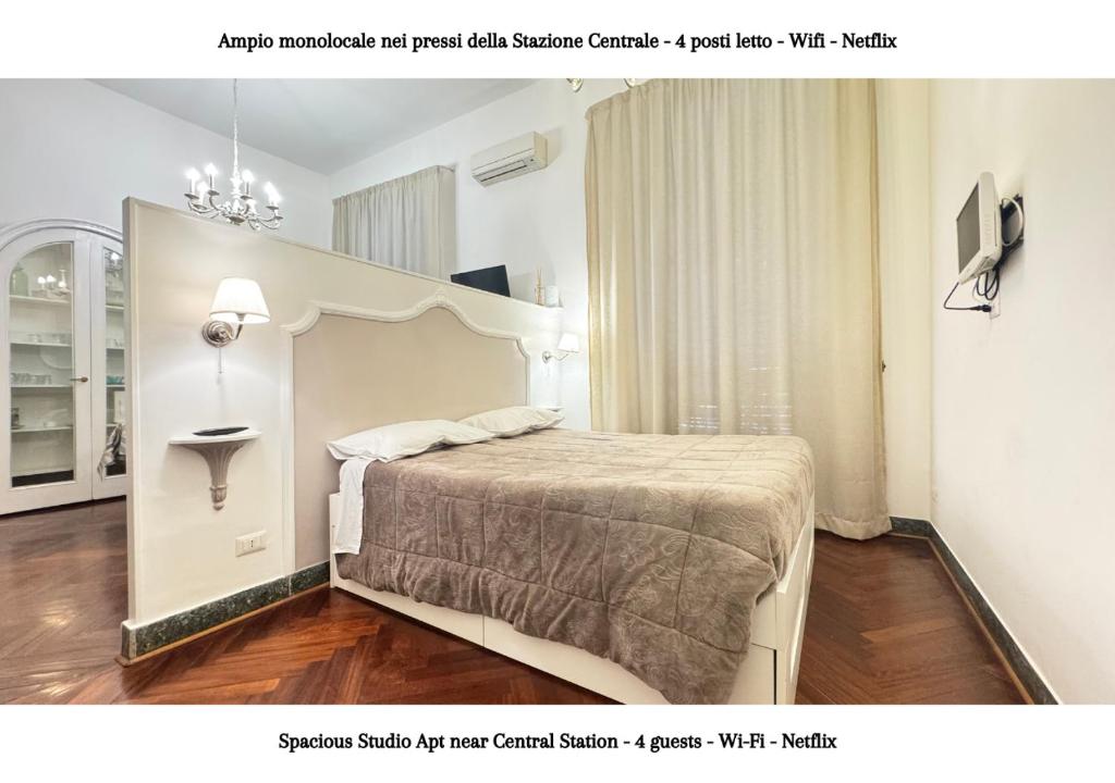 Posteľ alebo postele v izbe v ubytovaní METRO GARIBALDI - Loft con Wifi e 4 posti letto presso la Stazione Centrale di Napoli