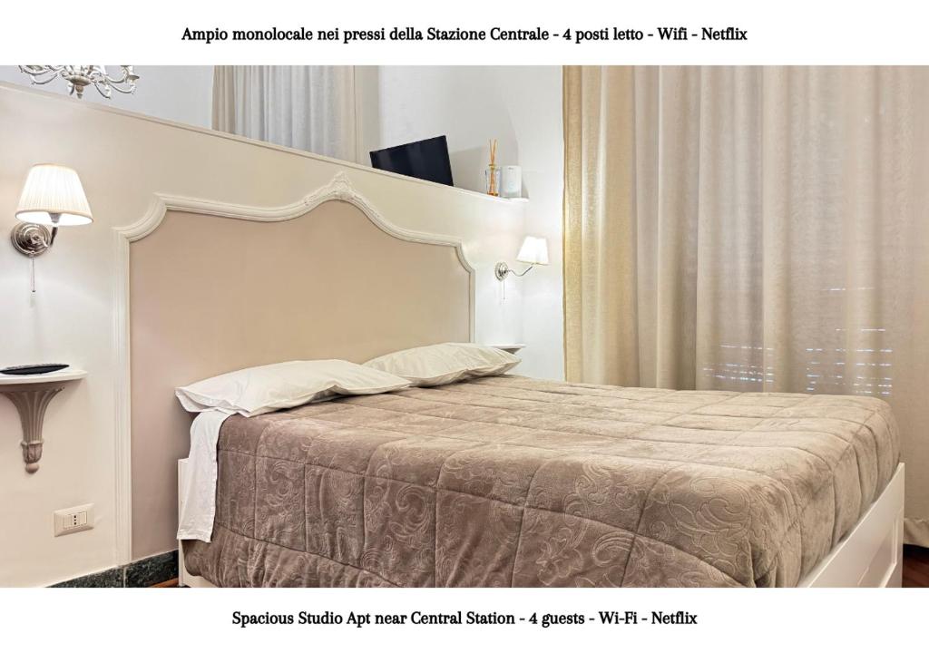 Posteľ alebo postele v izbe v ubytovaní METRO GARIBALDI - Loft con Wifi e 4 posti letto presso la Stazione Centrale di Napoli
