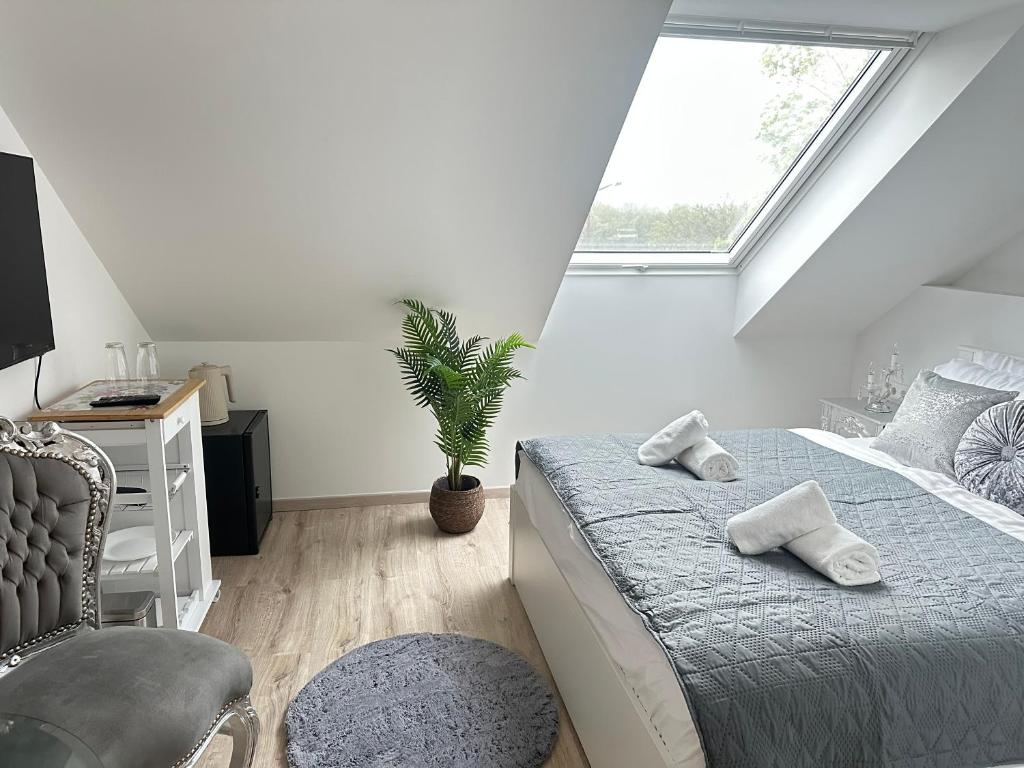 Postel nebo postele na pokoji v ubytování Duna-Part Deluxe