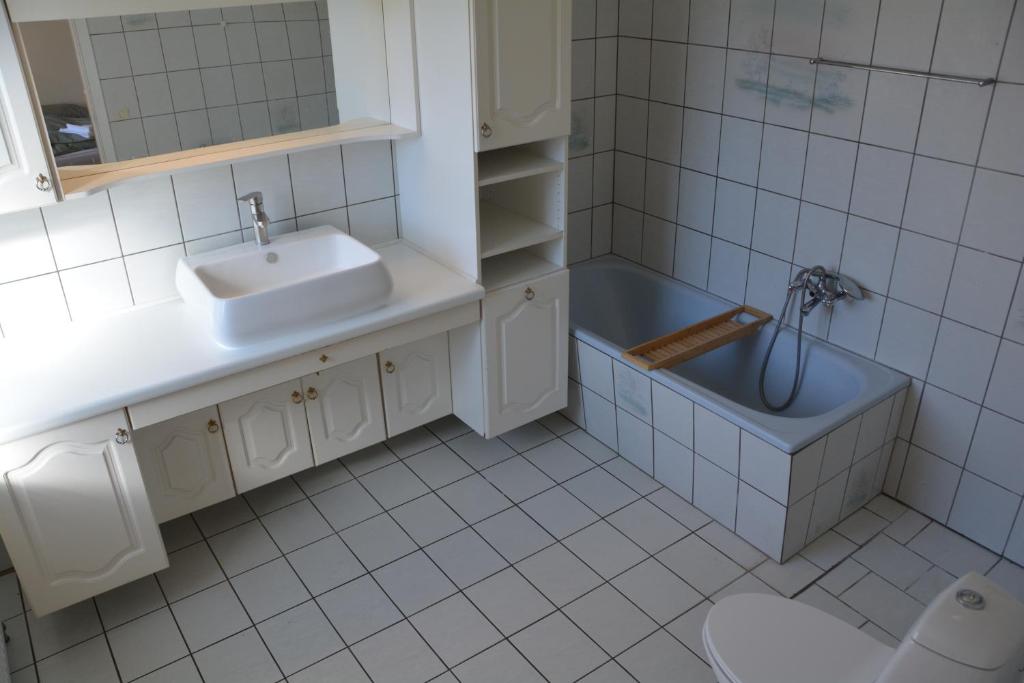 Koupelna v ubytování Abild Hotel