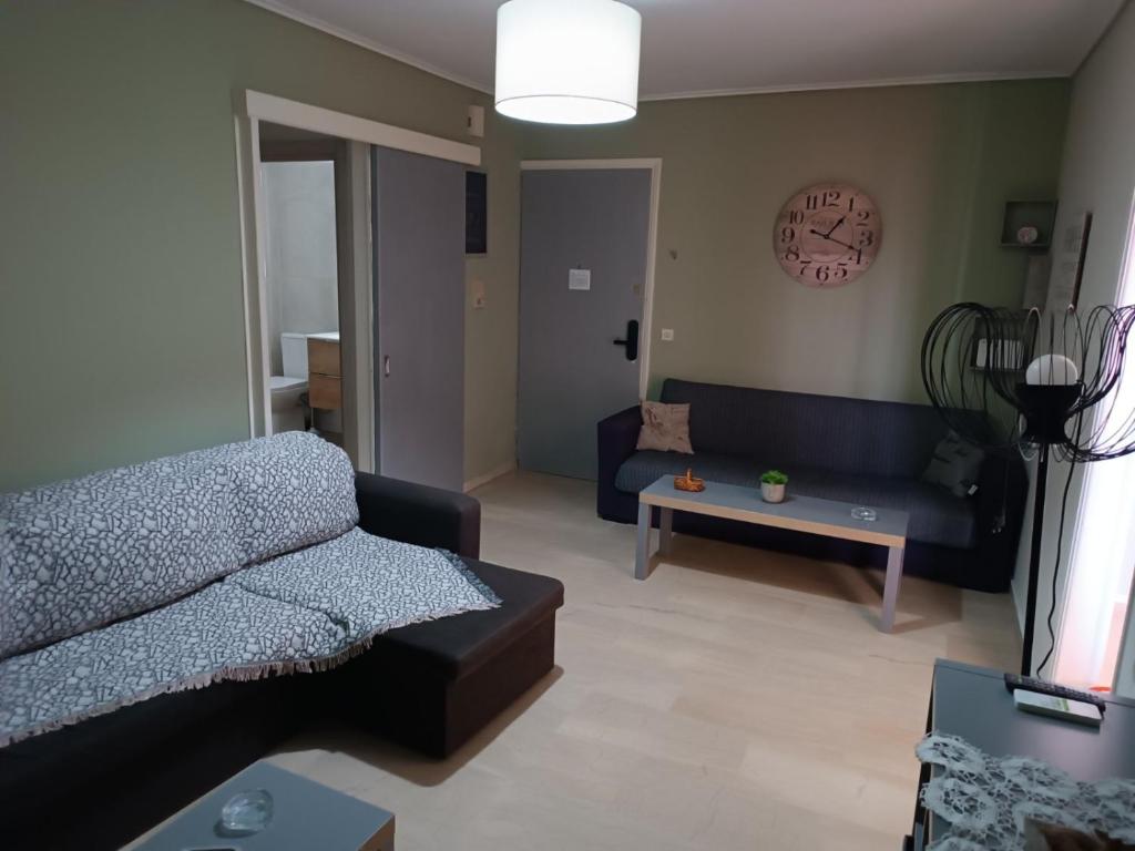 Posezení v ubytování COMFORTABLE BEACHFRONT APARTMENT