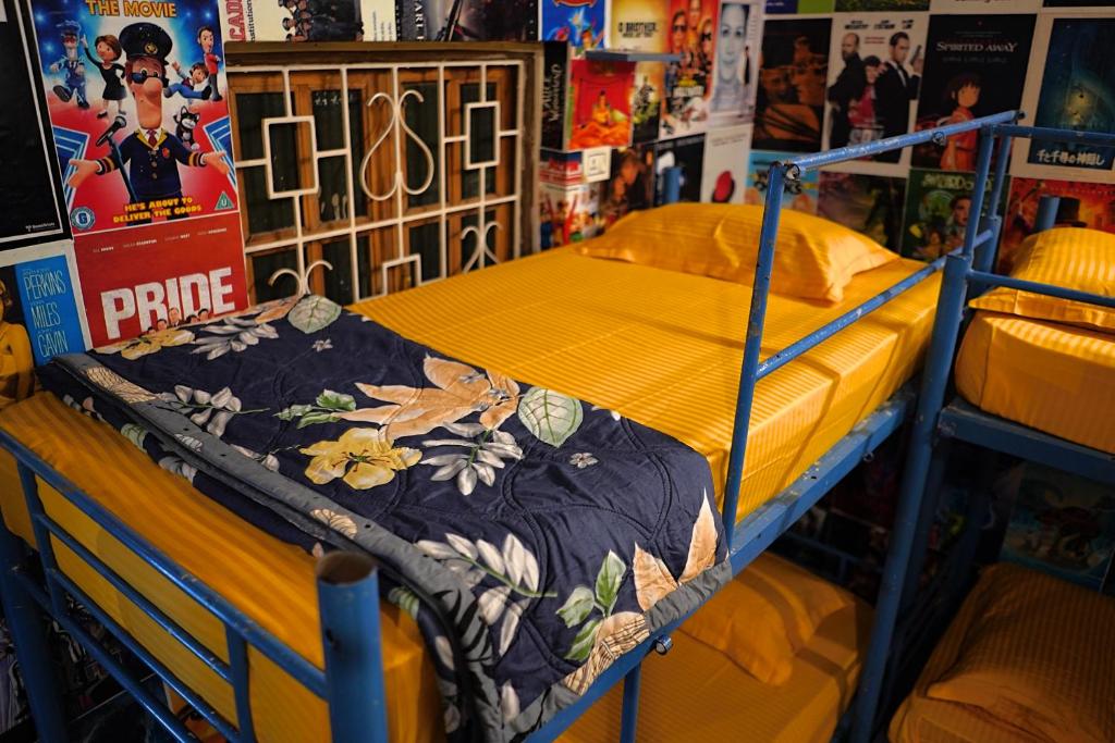 Postel nebo postele na pokoji v ubytování Pappi Chulo Vagator
