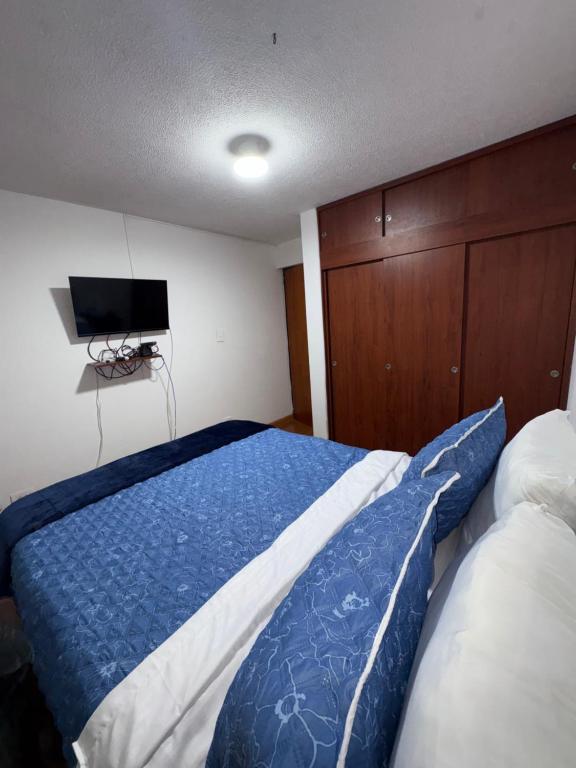 Postel nebo postele na pokoji v ubytování Hotel Dorado - Cerca al Aeropuerto - Habitación 201