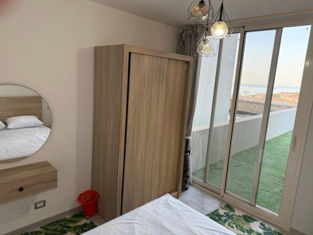 Katil atau katil-katil dalam bilik di Luxury Front SeaView Chalet