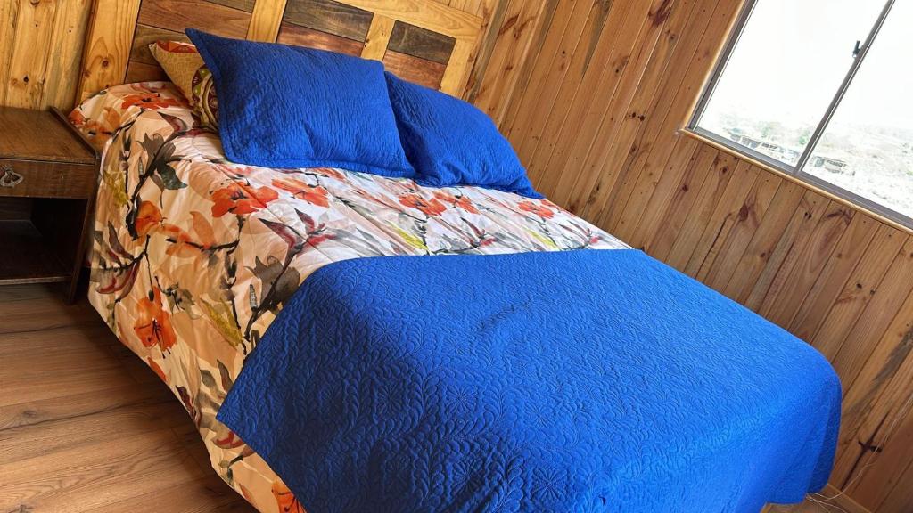 Postel nebo postele na pokoji v ubytování La Ultima Frontera