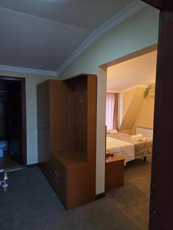Postel nebo postele na pokoji v ubytování Ritsa Boutique Hotel