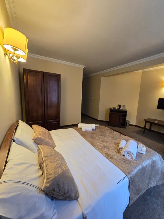 Postel nebo postele na pokoji v ubytování Ritsa Boutique Hotel