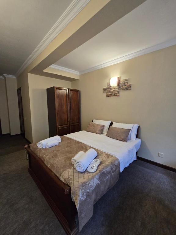 Postel nebo postele na pokoji v ubytování Ritsa Boutique Hotel