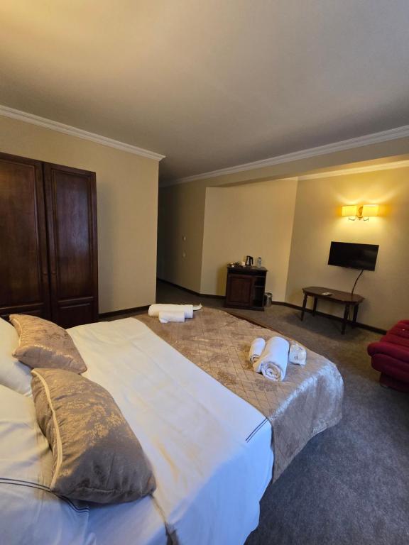 Postel nebo postele na pokoji v ubytování Ritsa Boutique Hotel