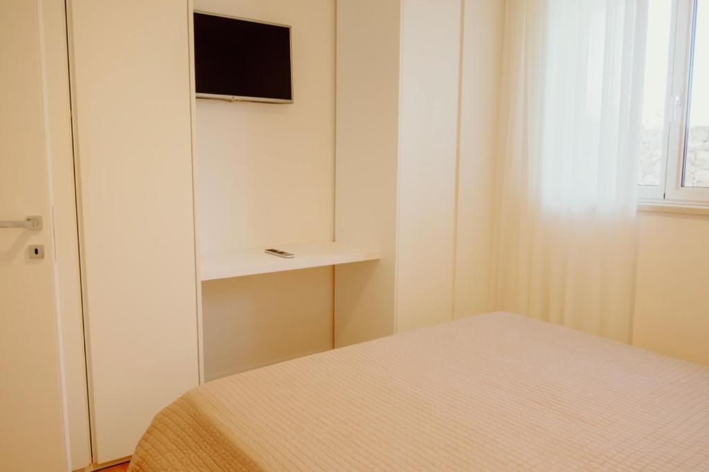 TV a/nebo společenská místnost v ubytování Venti D'Amare Suites