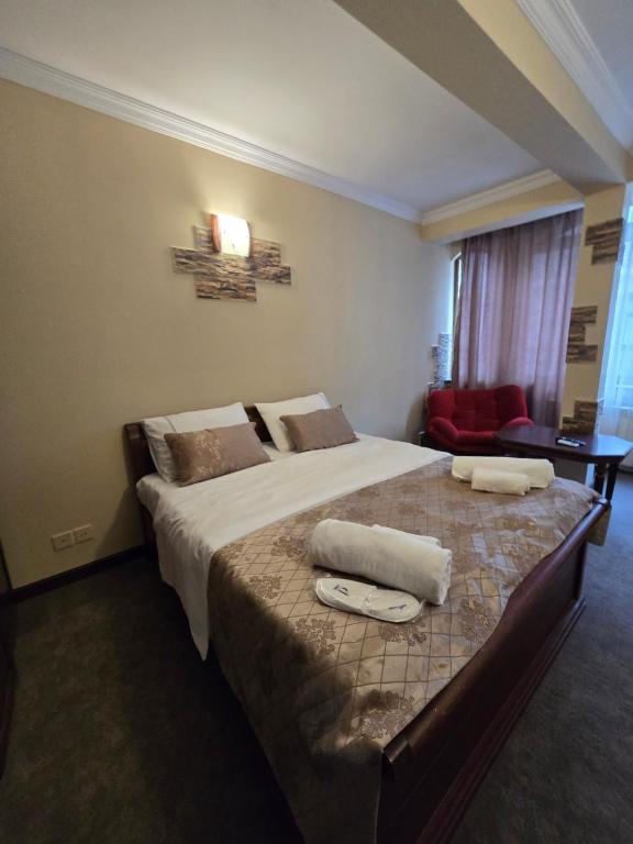 Postel nebo postele na pokoji v ubytování Ritsa Boutique Hotel