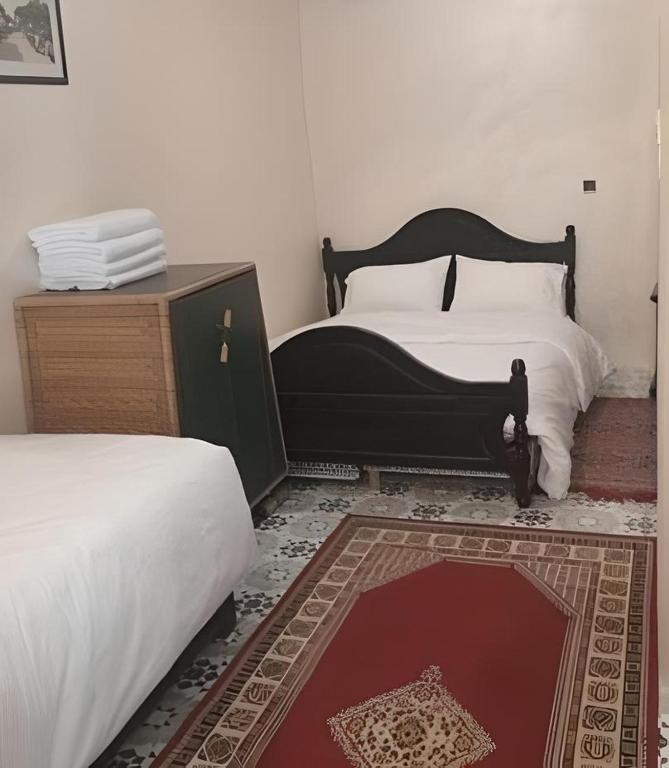 Postel nebo postele na pokoji v ubytování Riad Carole - Perfect for Families & Groups