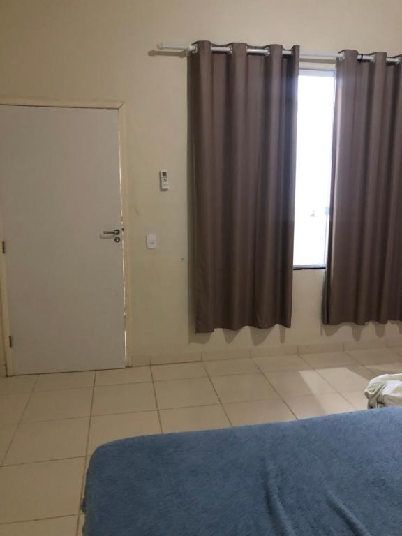Postel nebo postele na pokoji v ubytování Casa com piscina em Iranduba