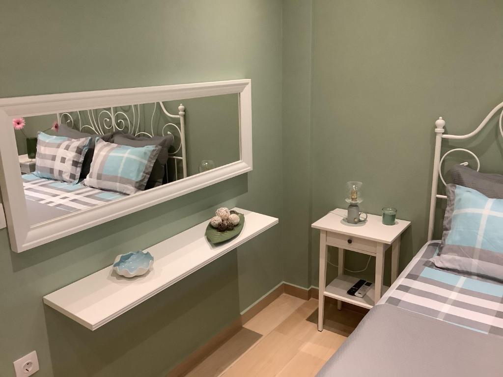 Postel nebo postele na pokoji v ubytování NG Luxury Apartments at Nea Kallikrateia No 1