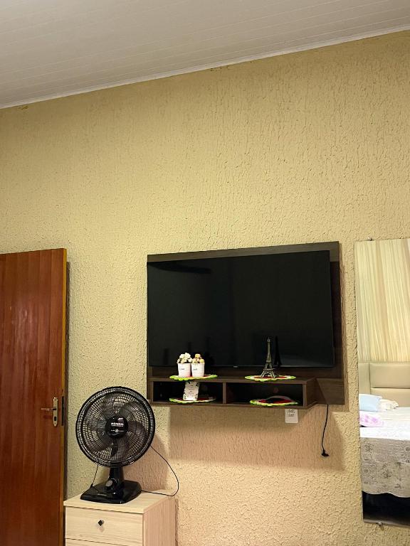 TV a/nebo společenská místnost v ubytování Casa Cantinho Do Sossego Piri