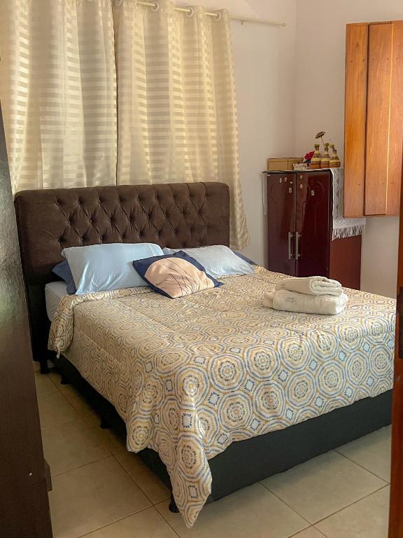 Postel nebo postele na pokoji v ubytování Casa Cantinho Do Sossego Piri